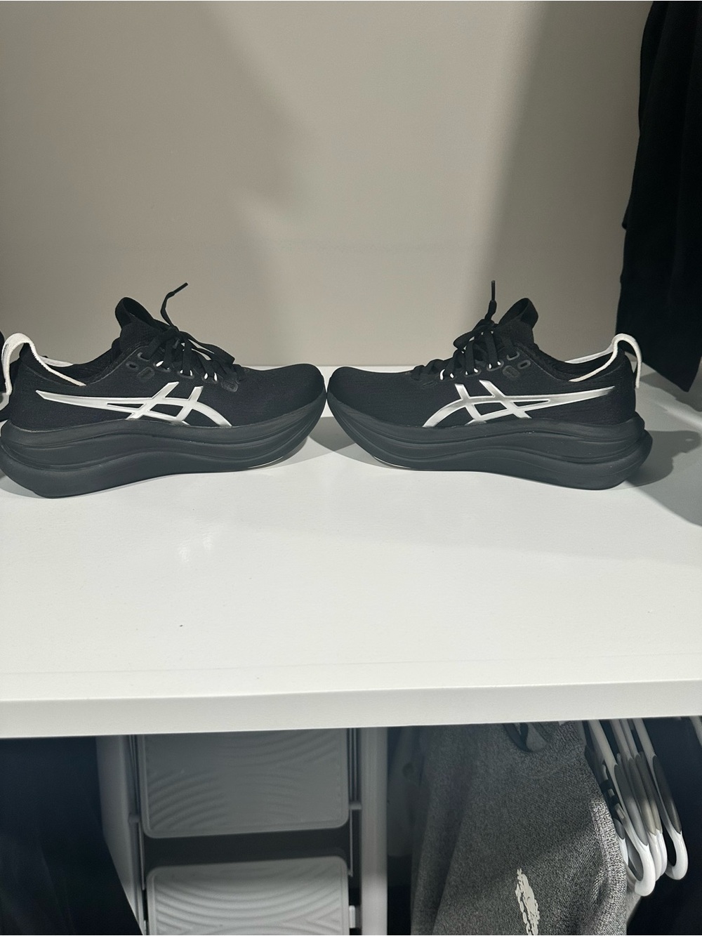 ASICS women’s Black and White Running Sneakers